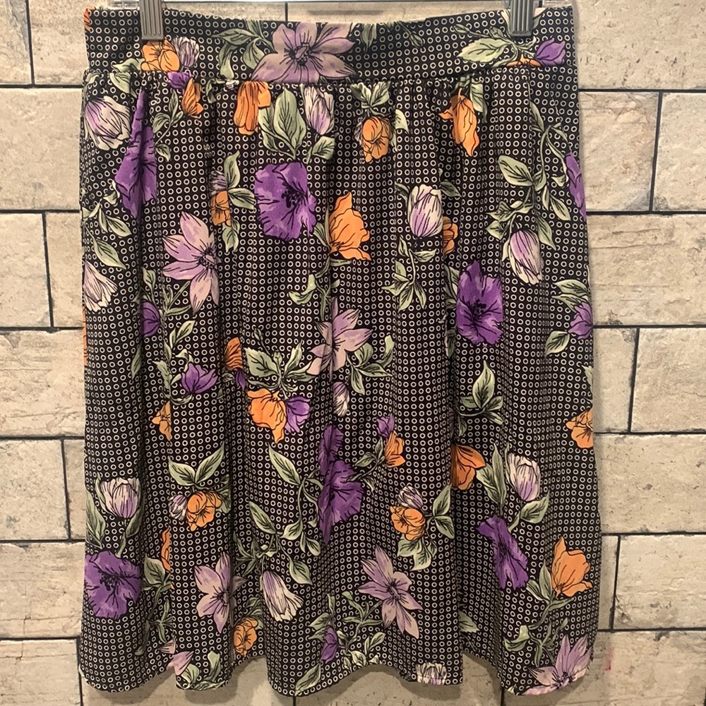 Jessy B.   Casual pull on floral knee length skirt